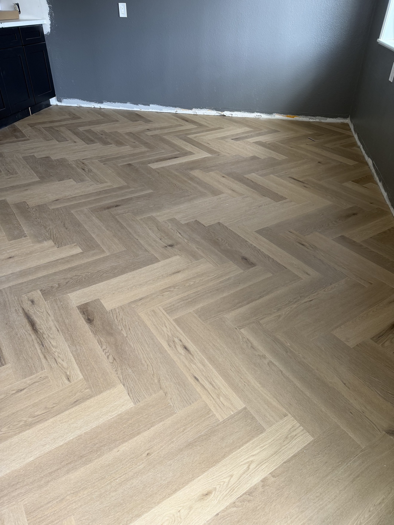Herringbone hardwood floor installation